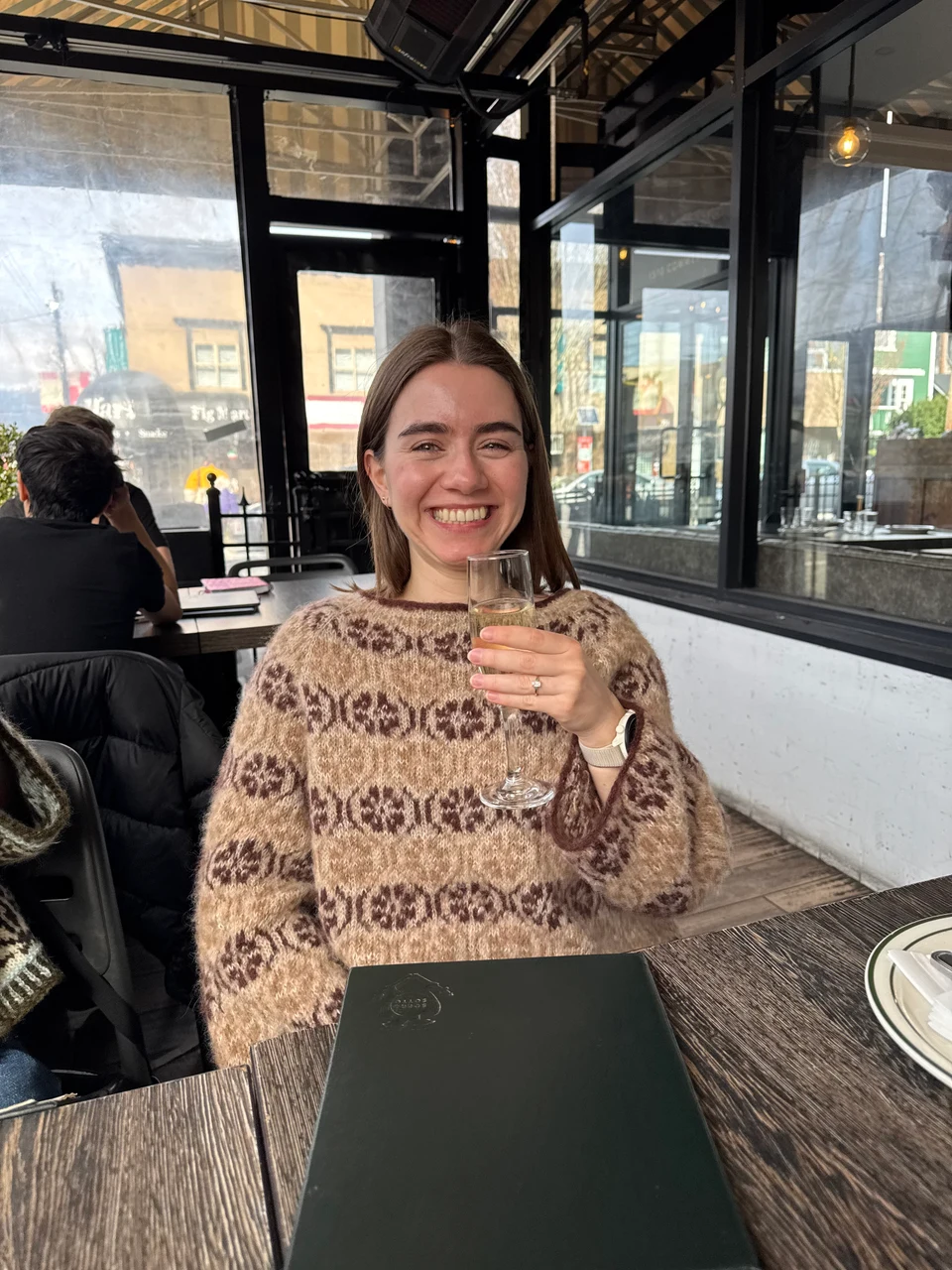 amy at a cafe table